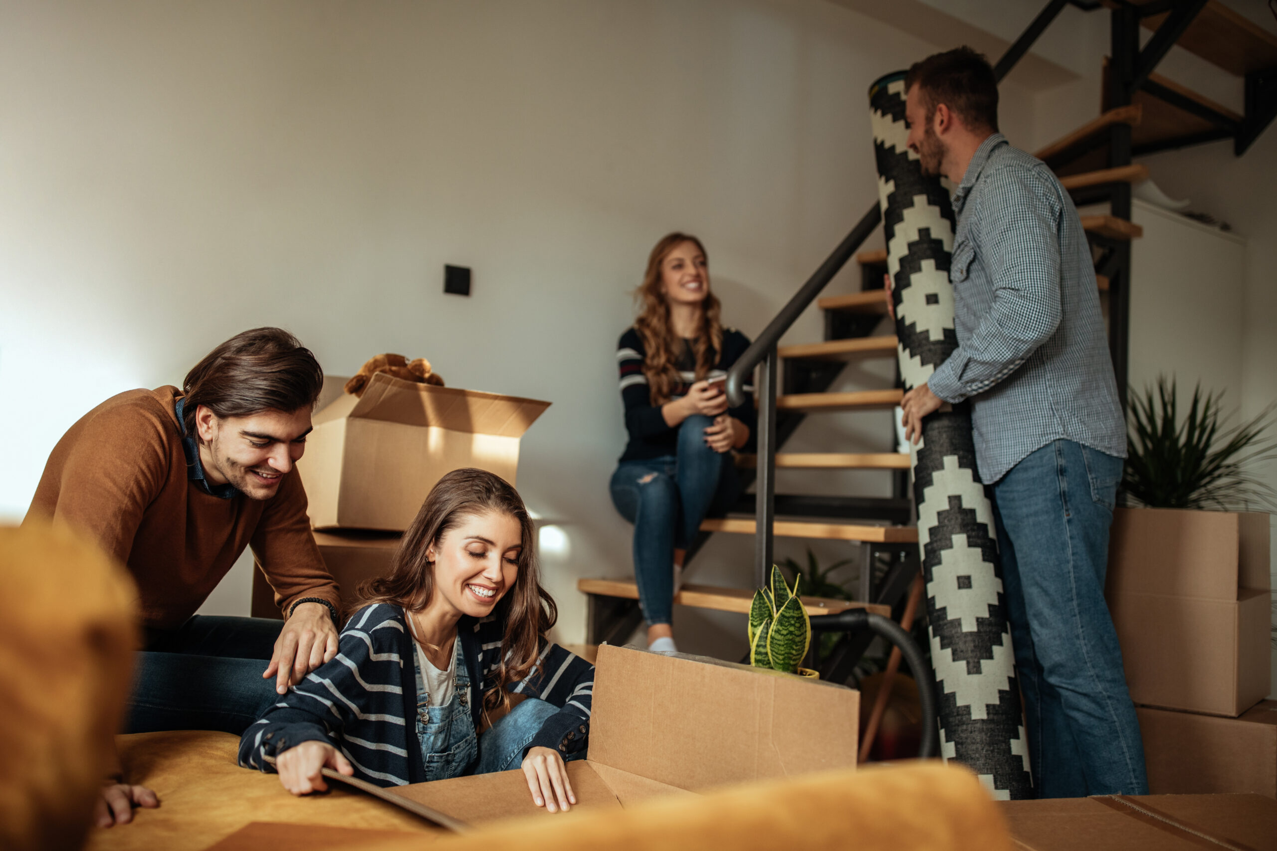 Friends moving into their new home